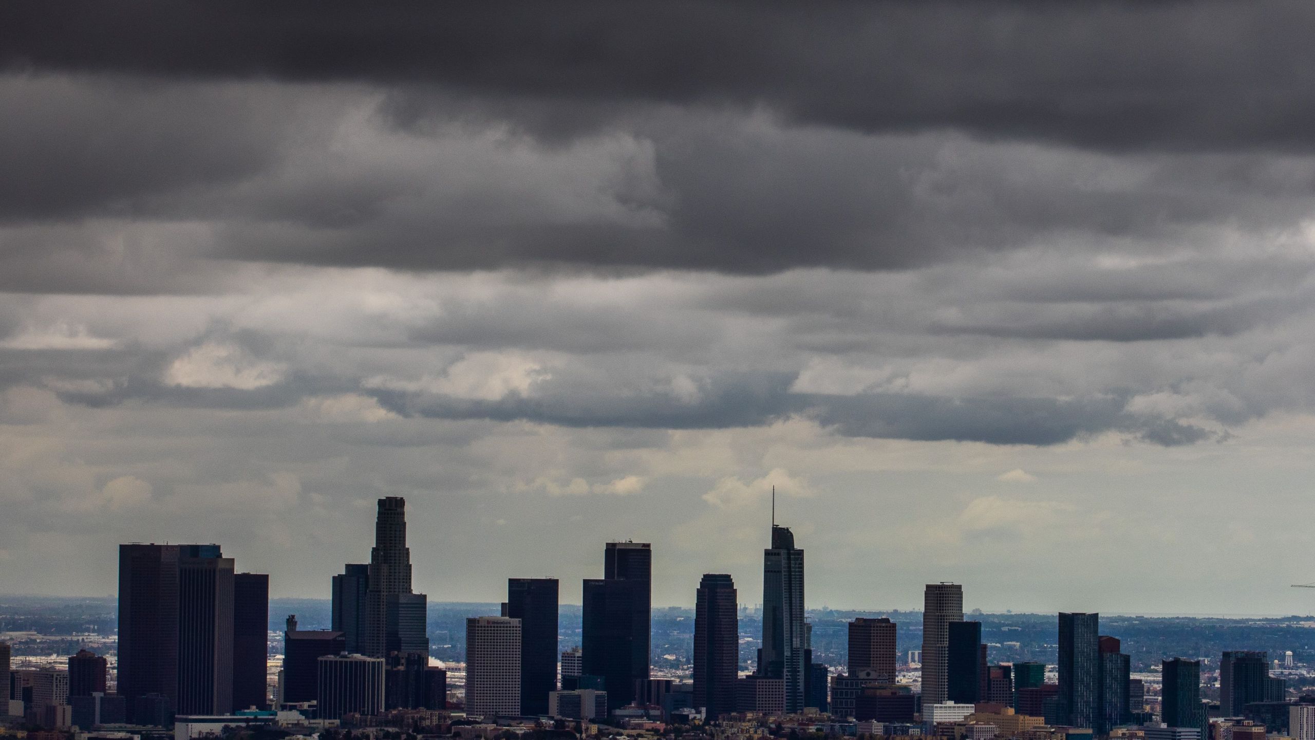 Heavy clouds are seen over downtown Los Angeles skyline from Griffth park on April 5, 2020 in Los Angeles, California. (APU GOMES/AFP via Getty Images)