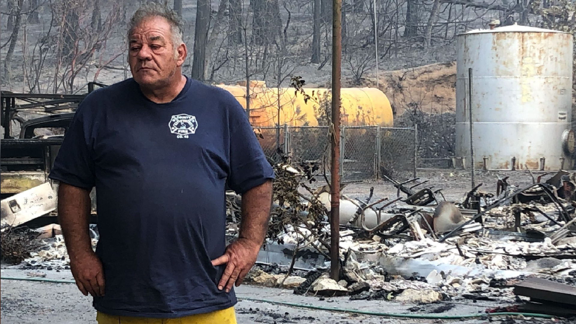 Volunteer fire Chief Reed Rankin is seen in an area destroyed by the North Complex fire in Berry Creek. (KTXL)