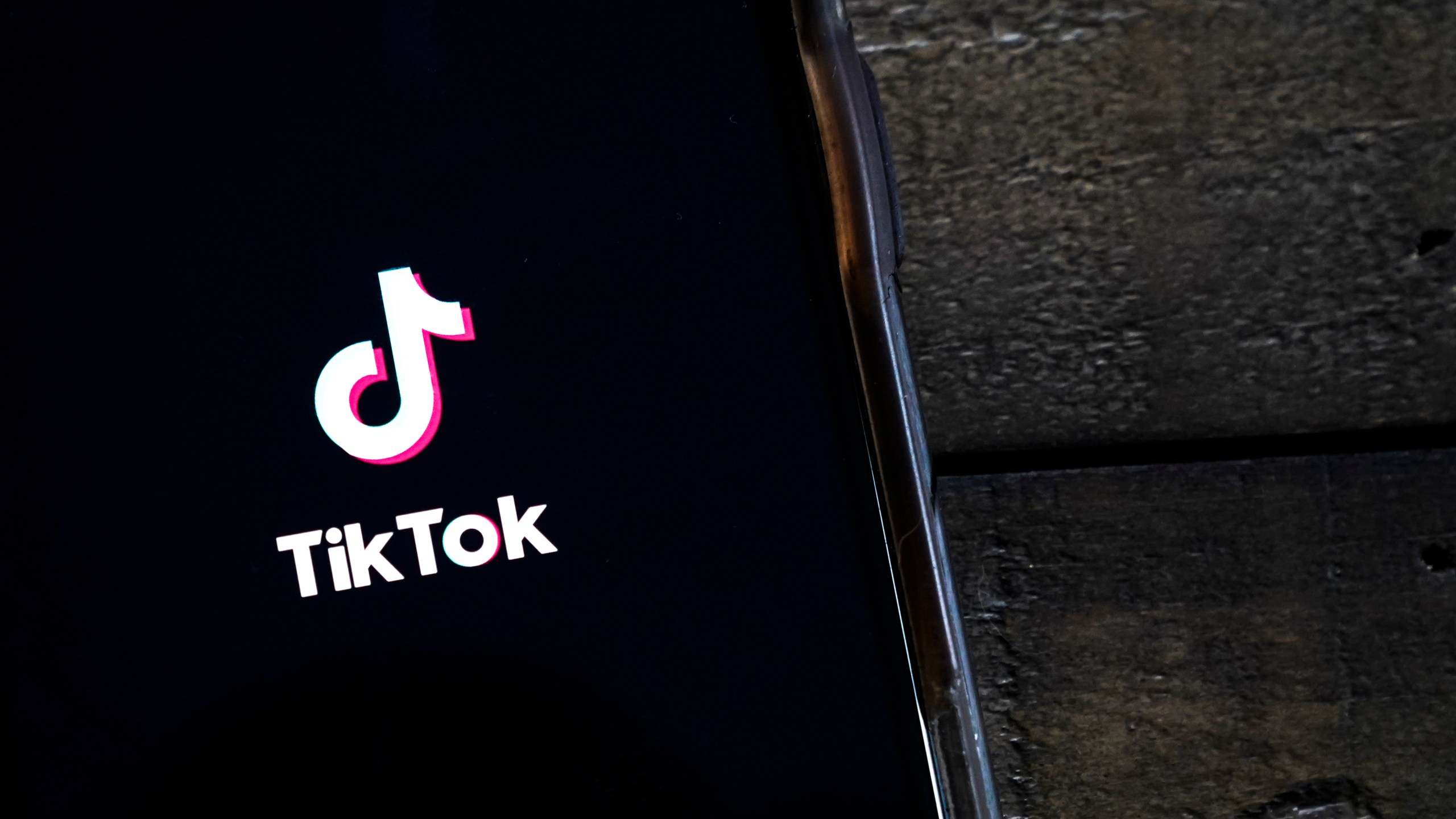 In this photo illustration, the TikTok app is displayed on an Apple iPhone on August 7, 2020 in Washington, DC. (Photo Illustration by Drew Angerer/Getty Images)