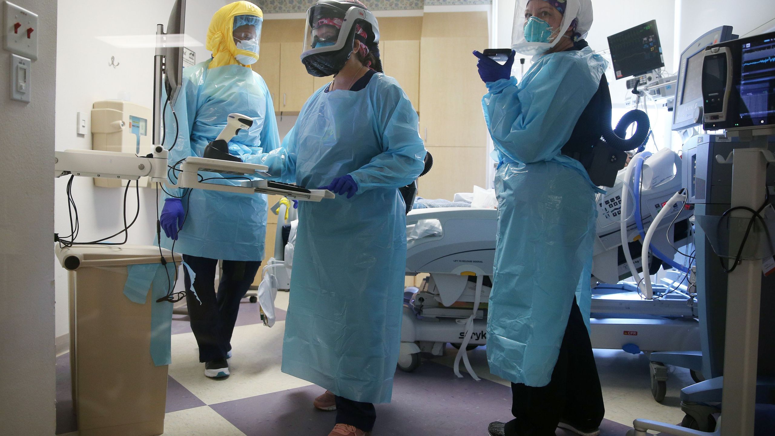 Clinicians care for a COVID-19 patient in the Intensive Care Unit (ICU) at El Centro Regional Medical Center in hard-hit Imperial County on July 21, 2020 in El Centro, California. (Mario Tama/Getty Images)