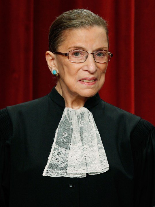 Justice Ruth Bader Ginsburg poses during a group photograph at the Supreme Court building on Sept. 29, 2009, in Washington, DC. (Photo by Mark Wilson/Getty Images)