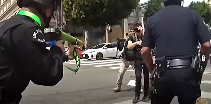 Body-camera video from the Los Angeles Police Department released on Sept. 18, 2020 shows an officer shooting a demonstrator in the groin with a projectile at close range during a protest in Hollywood on June 2, 2020. (LAPD)