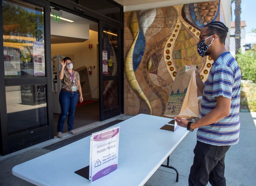 Select L.A. County Library locations now allow sidewalk pickup for printed documents and kits with laptops and mobile hot-spot devices.(County of Los Angeles)