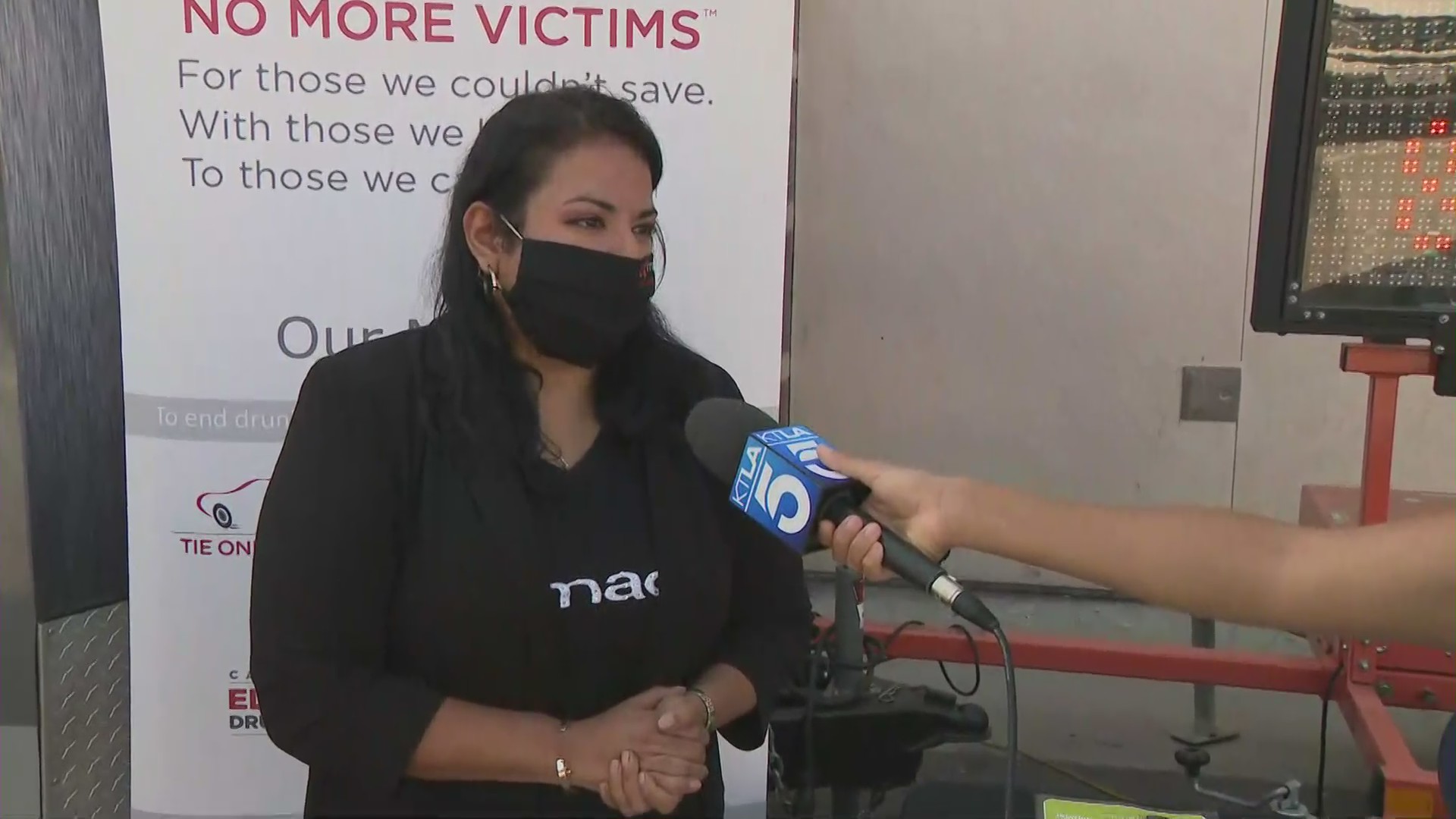 Patricia Rillera, MADD California state executive director, speaks at a DUI awareness campaign in Mid-City on Sept. 5, 2020. (KTLA)