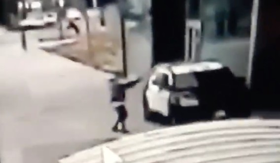 A person appears to fire into a Los Angeles County Sheriff's Department patrol vehicle in a still from footage released by the department on Sept. 12, 2020. Officials said the shooting occurred in Compton that same day.