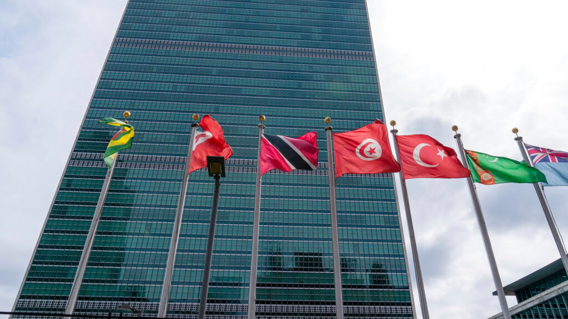 Member state flags fly outside the United Nations headquarters, Friday, Sept. 18, 2020, in New York. (AP Photo/Mary Altaffer)