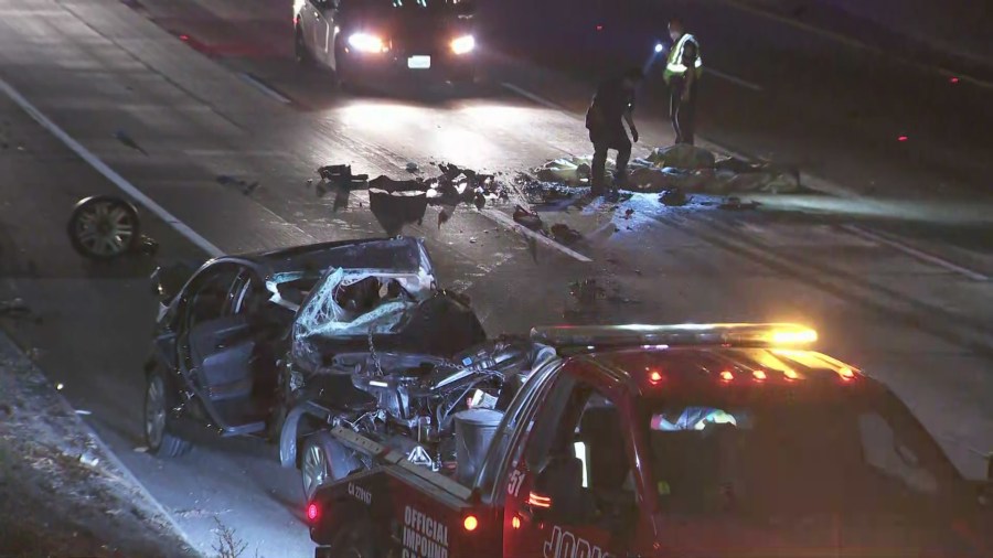 Crews work to clear the 101 Freeway in Hollywood after a fatal crash on Oct. 8, 2020. (KTLA)