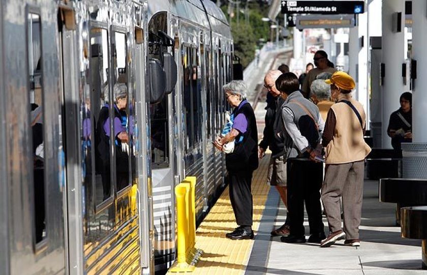 Passengers board a Metro train at the Little Tokyo Station in an undated photo. (Lawrence K. Ho / Los Angeles Times)