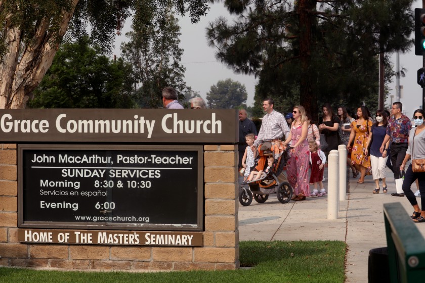 People head to Sunday service at Grace Community Church in Sun Valley on Sept. 13, 2020, amid the COVID-19 pandemic. (Genaro Molina / Los Angeles Times)