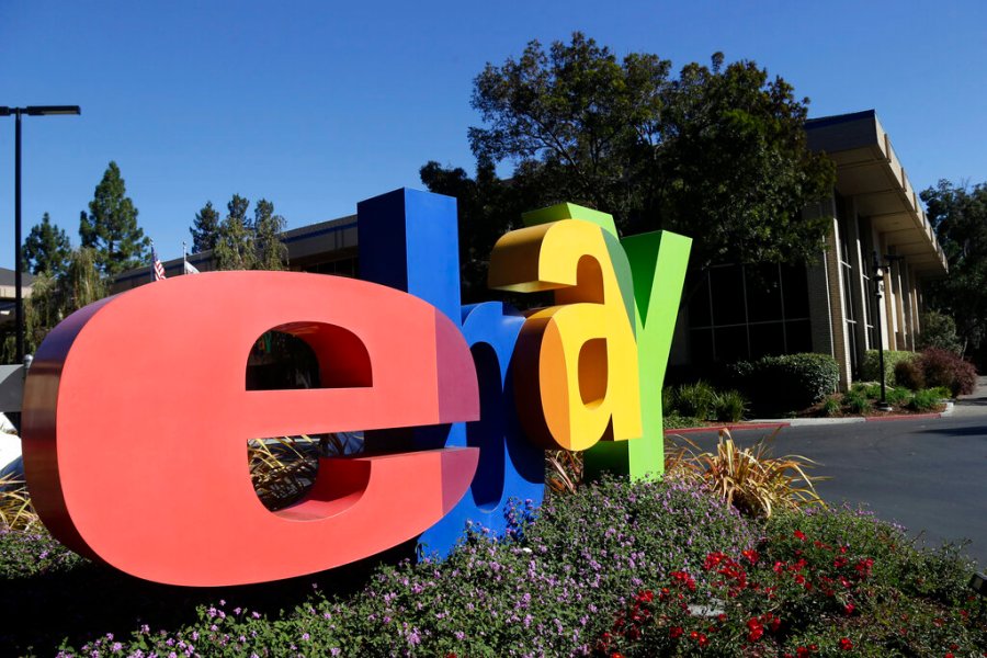 In this Oct. 17, 2012, file photo, an eBay sign sits in front of the company's headquarters in San Jose, Calif. AP Photo/Marcio Jose Sanchez, File)