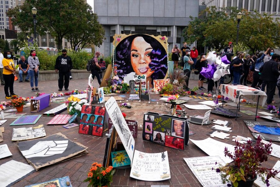 In this Wednesday, Sept. 23, 2020, file photo, people gather in Jefferson Square in Louisville, awaiting word on charges against police officers in the death of Breonna Taylor. (AP Photo/Darron Cummings, File)