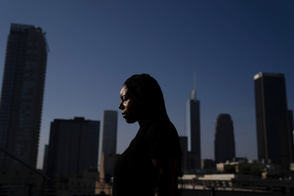 Efuru Flowers, a co-founder of Black Women Rally for Action, poses for photos Monday, Sept. 28, 2020, in Los Angeles. (AP Photo/Jae C. Hong)