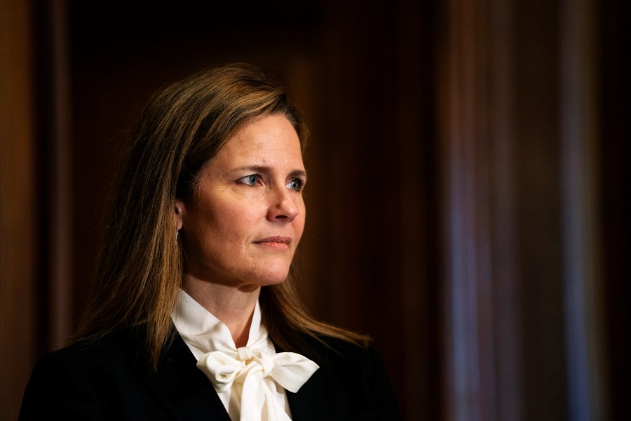 Judge Amy Coney Barrett, President Donald Trump's nominee for the U.S. Supreme Court, meets with Sen. Josh Hawley, R-Mo., on Capitol Hill in Washington on Oct. 1, 2020. (Demetrius Freeman/The Washington Post via AP, Pool)