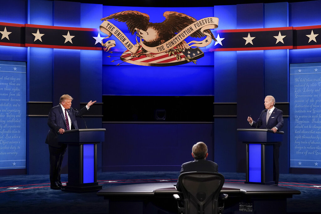 President Donald Trump, left, and Democratic presidential candidate former Vice President Joe Biden, right, during the first presidential debate on Sept. 29, 2020, at Case Western University and Cleveland Clinic, in Cleveland, Ohio. (AP Photo/Patrick Semansky)