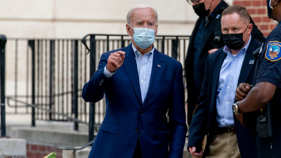 Democratic presidential candidate former Vice President Joe Biden speaks to member of the media as he leaves St. Joseph Catholic Church on Oct. 3, 2020, in Wilmington, Del. (AP Photo/Andrew Harnik)