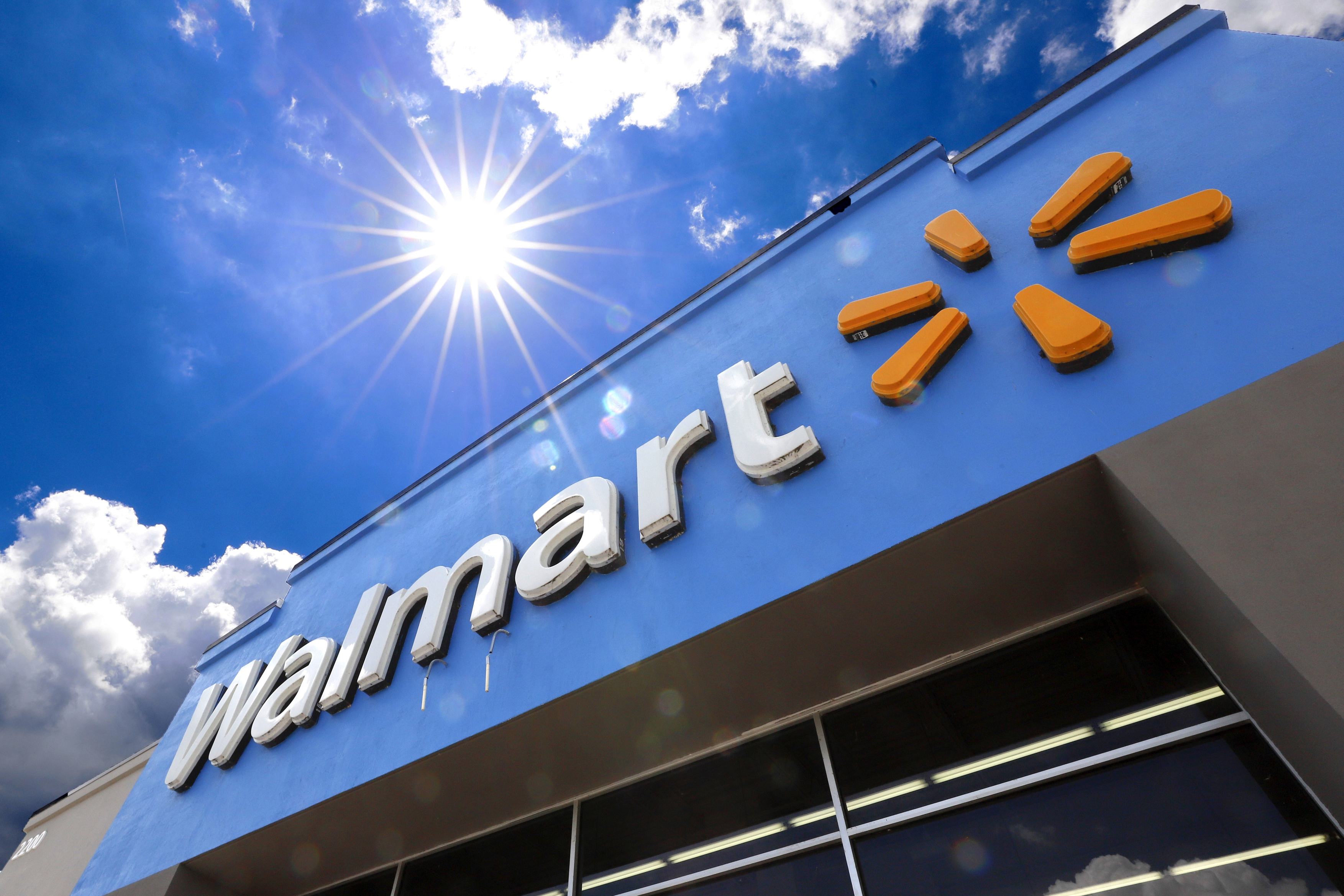 This June 25, 2019, file photo shows the entrance to a Walmart in Pittsburgh. Walmart is spreading out its traditional one-day Black Friday deals over three weekends in November 2020 in an effort to reduce crowds in its stores amid the coronavirus pandemic. (AP Photo/Gene J. Puskar, File)