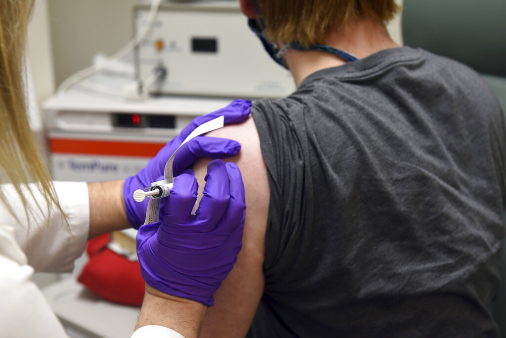 The first patient enrolled in Pfizer's COVID-19 coronavirus vaccine clinical trial at the University of Maryland School of Medicine in Baltimore, receives an injection on May 4, 2020. (University of Maryland School of Medicine via AP)