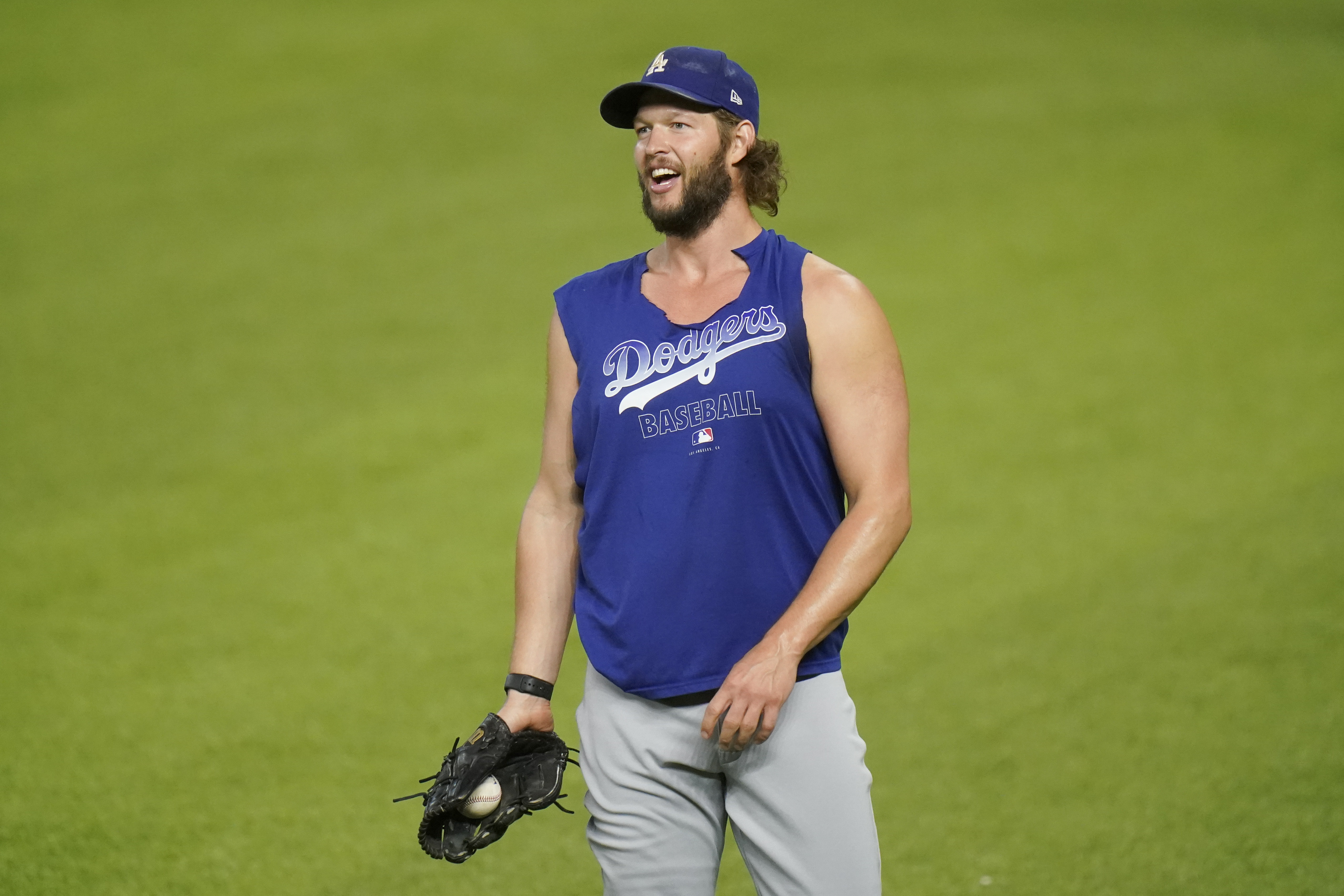 Los Angeles Dodgers starting pitcher Clayton Kershaw works out before Game 3 of the National League Championship Series against the Atlanta Braves on Oct. 14, 2020, in Arlington, Texas. (Eric Gay / Associated Press)