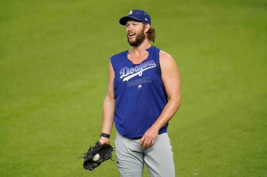 Los Angeles Dodgers starting pitcher Clayton Kershaw works out before Game 3 of the National League Championship Series against the Atlanta Braves on Oct. 14, 2020, in Arlington, Texas. (Eric Gay / Associated Press)