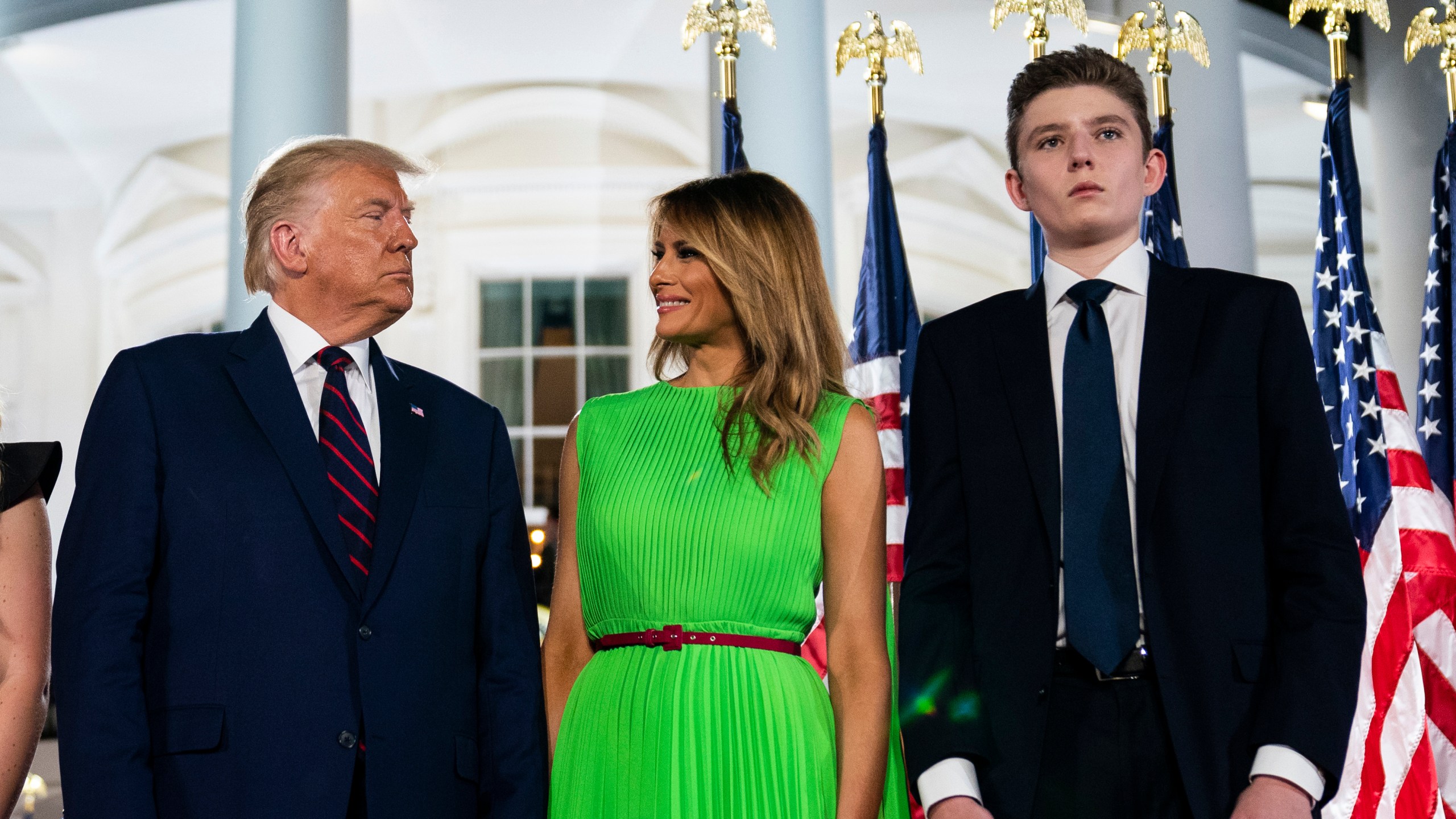 In this Aug. 27, 2020 file photo, Barron Trump right, stands with President Donald Trump and first lady Melania Trump on the South Lawn of the White House during the Republican National Convention (Evan Vucci/Associated Press)