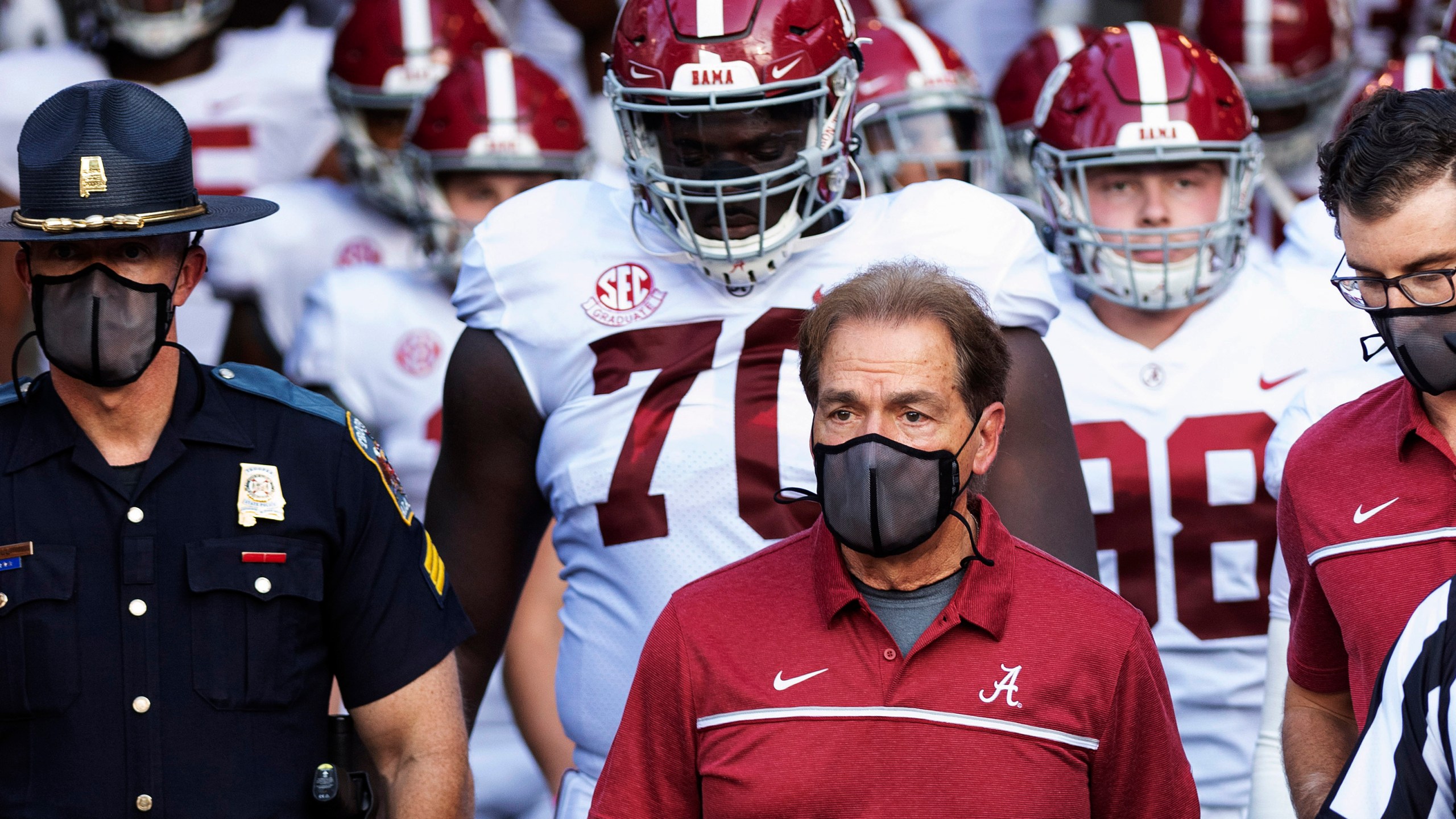 Alabama coach Nick Saban leads his team to the field before an NCAA college football game against Missouri in Columbia, Missouri, on Sept. 26, 2020. (L.G. Patterson / Associated Press)