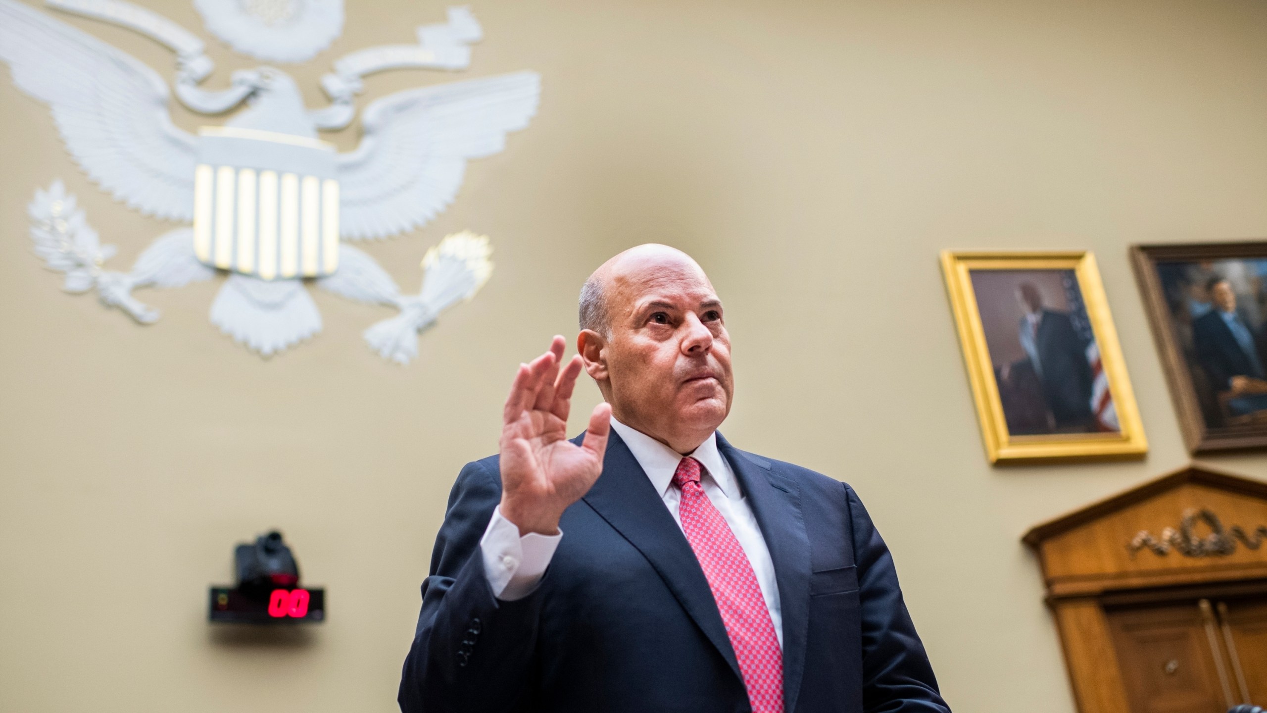 In this Monday, Aug. 24, 2020, file photo, Postmaster General Louis DeJoy is sworn in before testifying during a House Oversight and Reform Committee hearing on the Postal Service on Capitol Hill in Washington. (Tom Williams/AP)