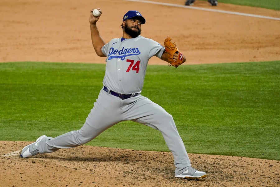 Los Angeles Dodgers relief pitcher Kenley Jansen throws against the Atlanta Braves during the ninth inning in Game 5 of a baseball National League Championship Series Friday, Oct. 16, 2020, in Arlington, Texas. (AP Photo/Tony Gutierrez)