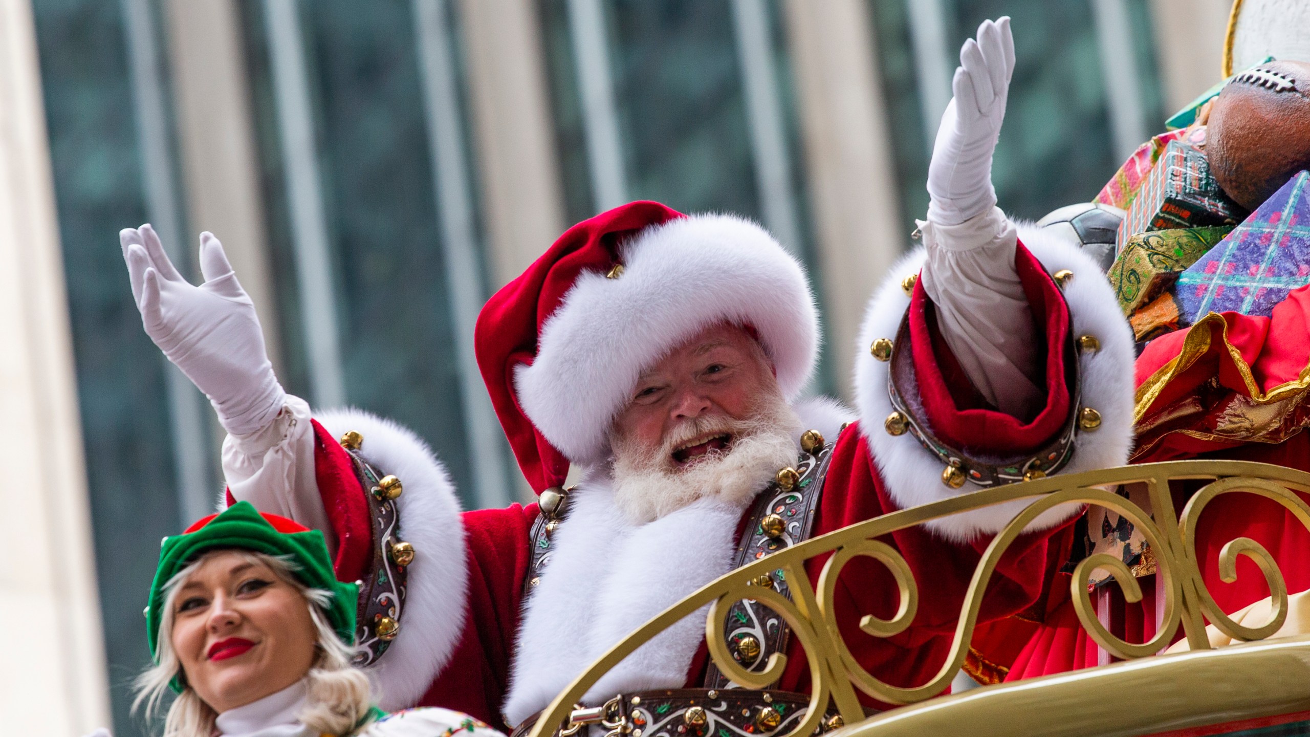 Santa Claus waves during the Macy's Thanksgiving Day Parade, Nov. 28, 2019, in New York. Macy's said Santa Claus won't be greeting kids at its flagship New York store this year due to the coronavirus, interrupting a holiday tradition started nearly 160 years ago. However, Macy's said the jolly old man will still appear at the end of the televised Macy's Thanksgiving Day parade. (AP Photo/Eduardo Munoz Alvarez, File)