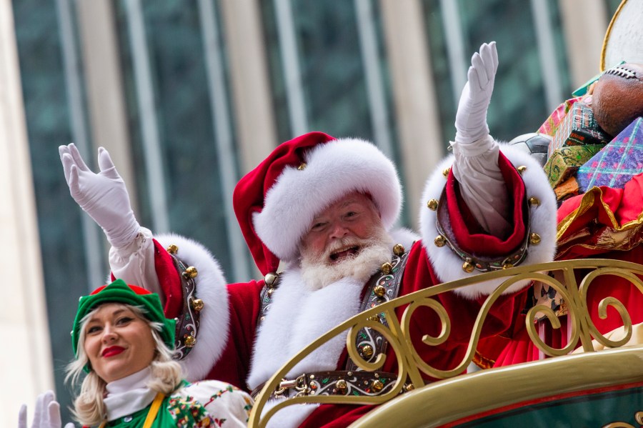 Santa Claus waves during the Macy's Thanksgiving Day Parade, Nov. 28, 2019, in New York. Macy's said Santa Claus won't be greeting kids at its flagship New York store this year due to the coronavirus, interrupting a holiday tradition started nearly 160 years ago. However, Macy's said the jolly old man will still appear at the end of the televised Macy's Thanksgiving Day parade. (AP Photo/Eduardo Munoz Alvarez, File)