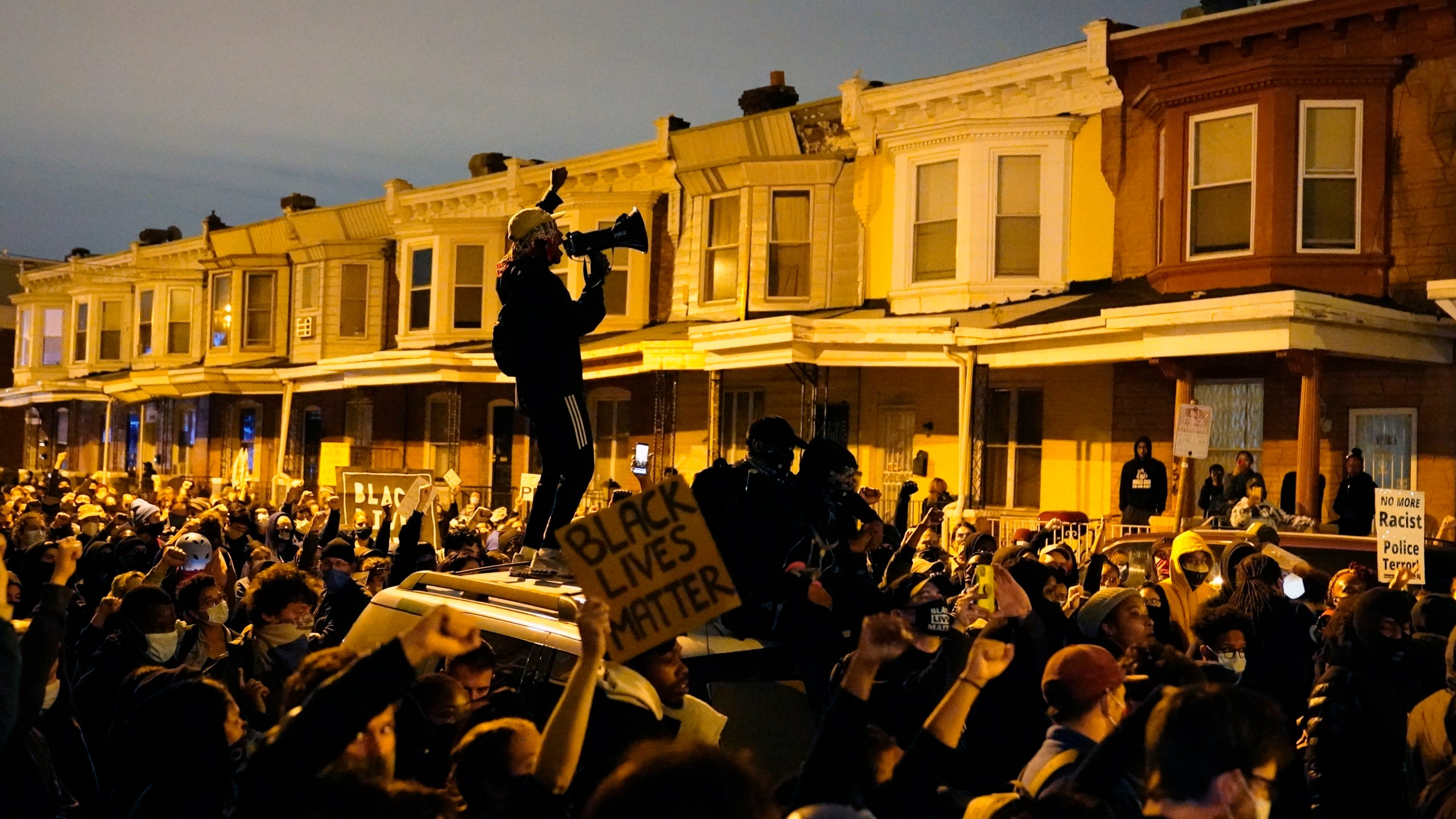 Protesters confront police during a march Tuesday Oct. 27, 2020 in Philadelphia. (AP Photo/Matt Slocum)