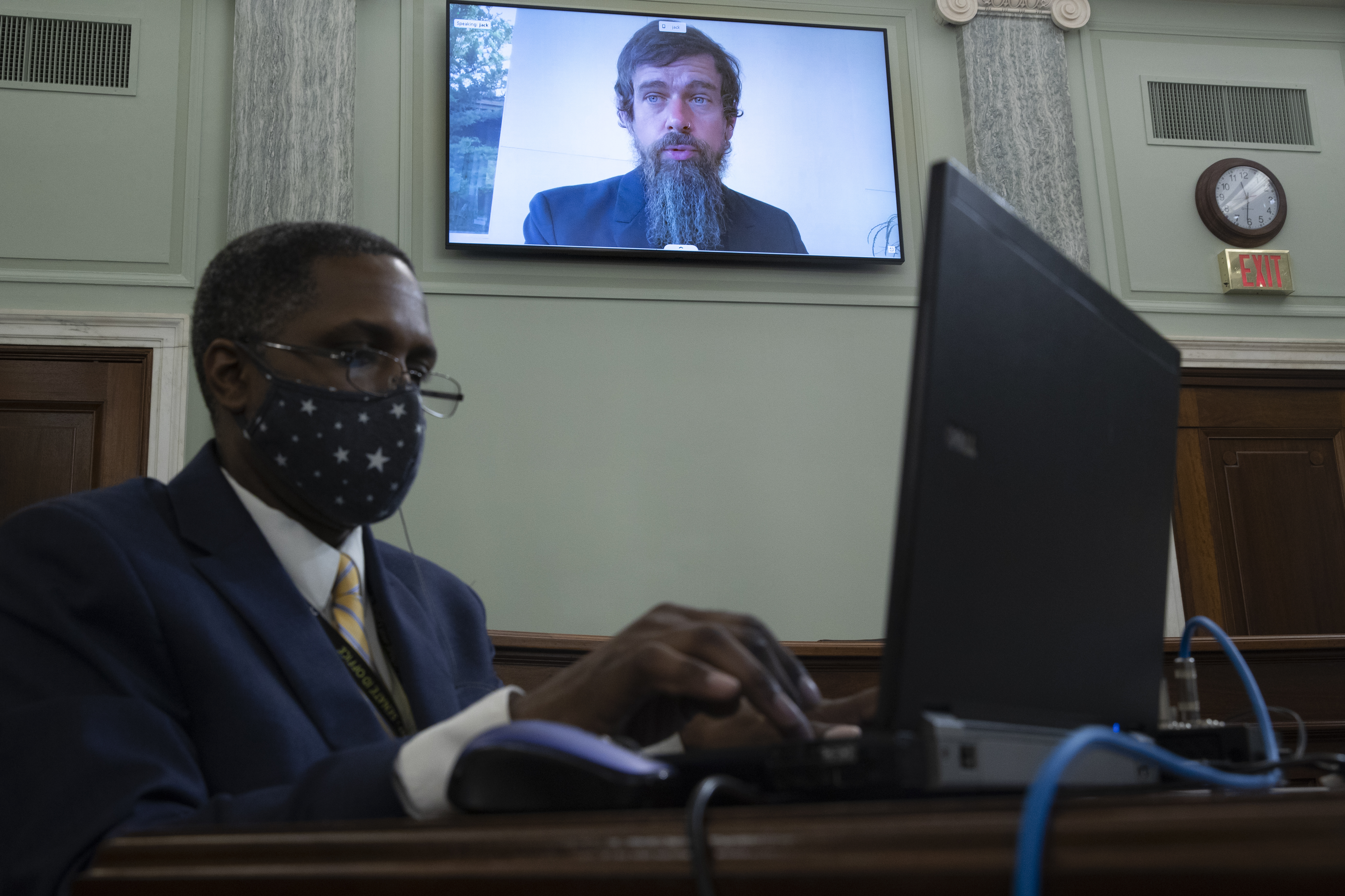 Twitter CEO Jack Dorsey appears on a screen as he speaks remotely during a hearing before the Senate Commerce Committee on Oct. 28, 2020. (Michael Reynolds/Pool via Associated Press)