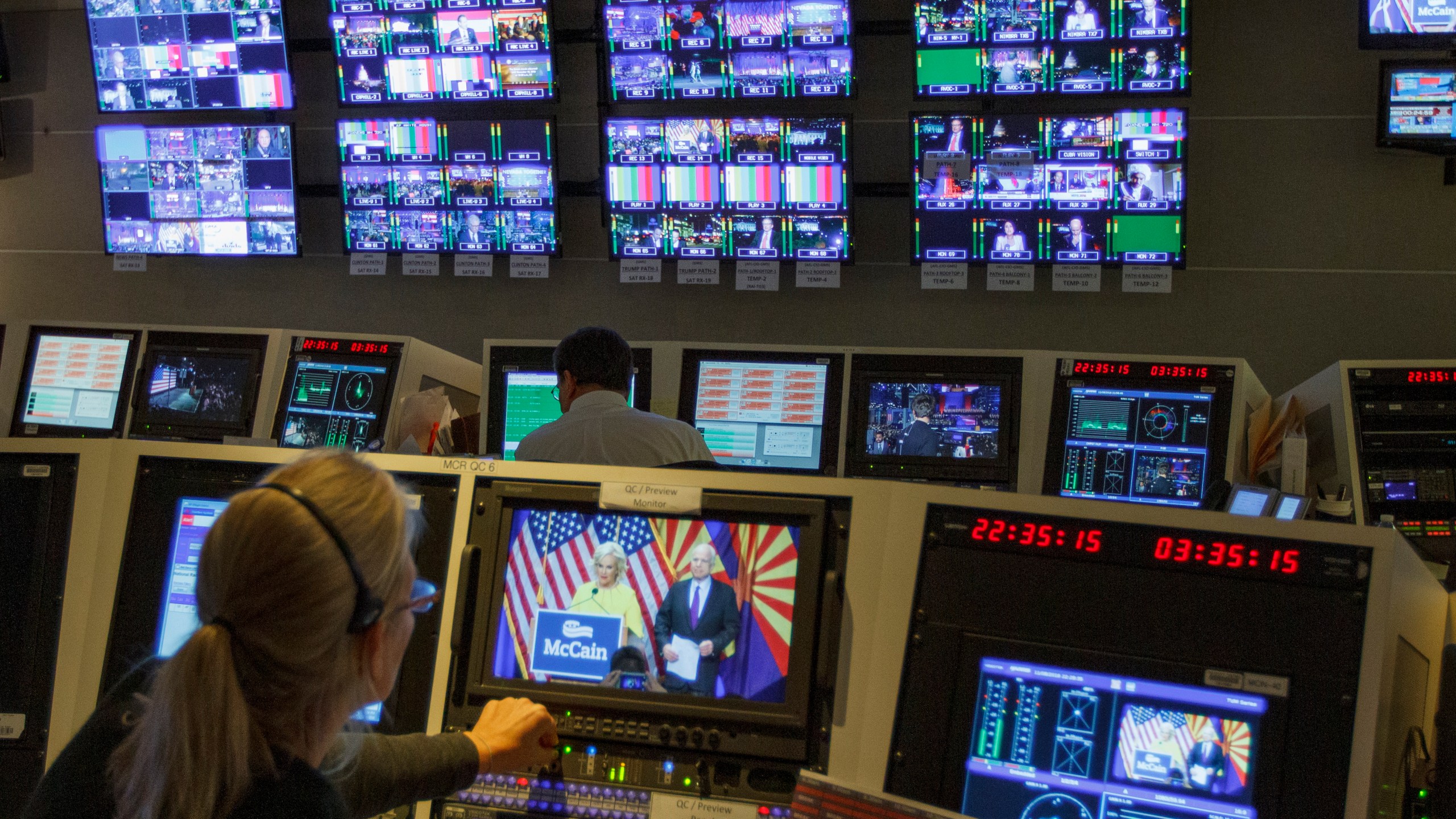 In this Nov. 8, 2016, photo, staff members of The Associated Press Television Network work in master control at the organization's Washington bureau as returns come in during election night. (Jon Elswick / Associated Press)