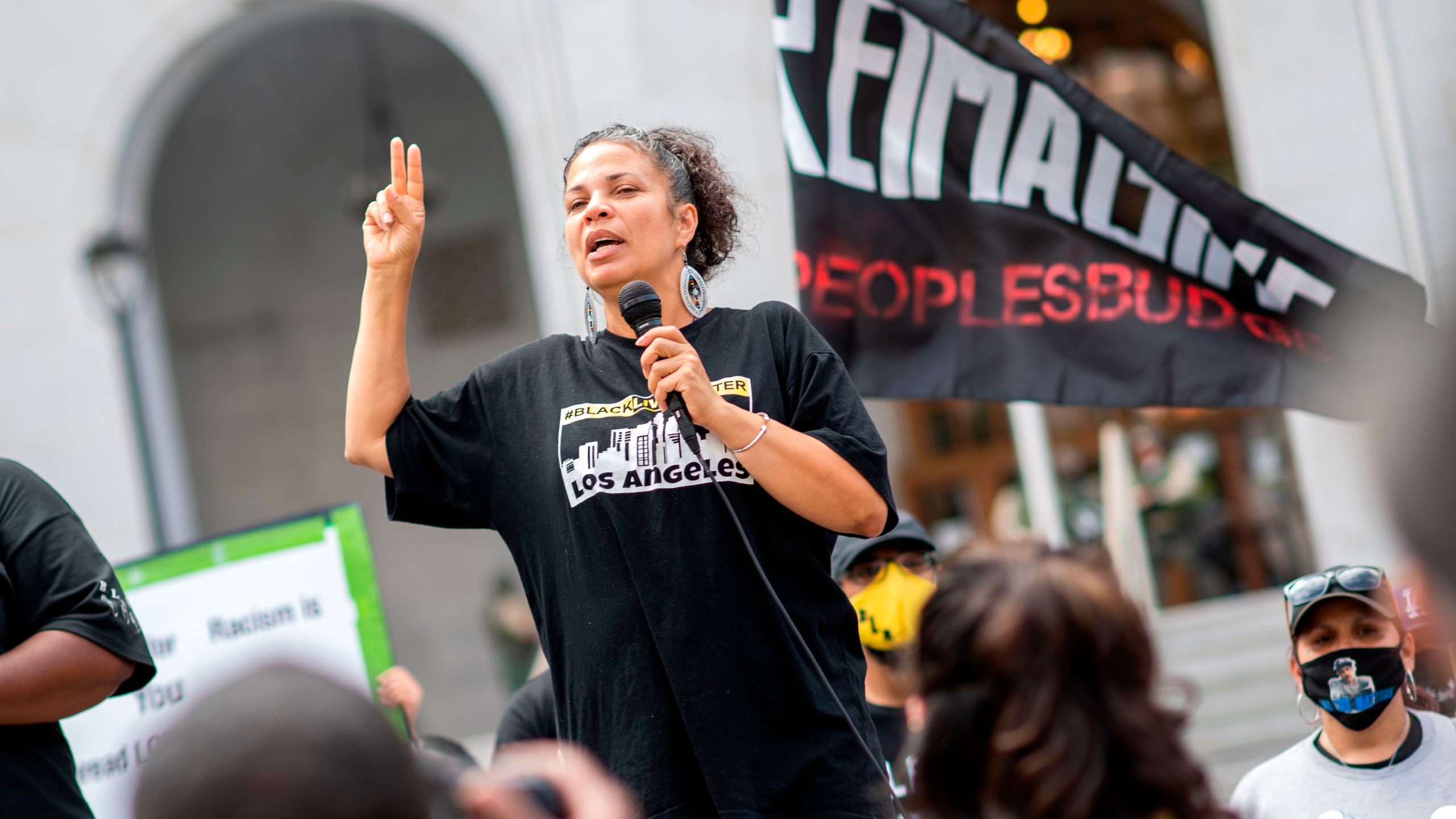 Melina Abdullah from Black Lives Matter addresses the crowd during a demonstration to ask for the removal of District Attorney Jackie Lacey in front of the Hall of Justice, in Los Angeles on June 17, 2020. (Valerie Macon/AFP via Getty Images)