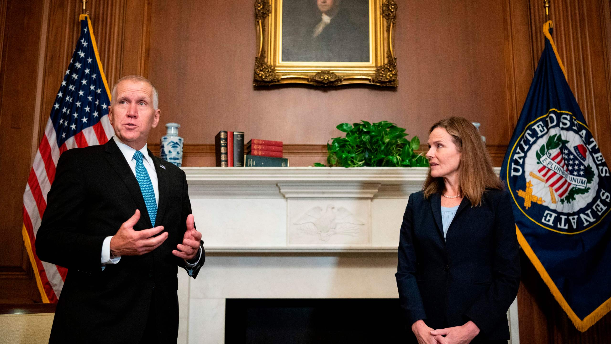 Supreme Court Nominee Amy Coney Barrett, right, meets with U.S. Sen. Thom Tillis, Republican of North Carolina, at the U.S. Capitol on Sept. 30, 2020, in Washington, D.C. (BILL CLARK/POOL/AFP via Getty Images)