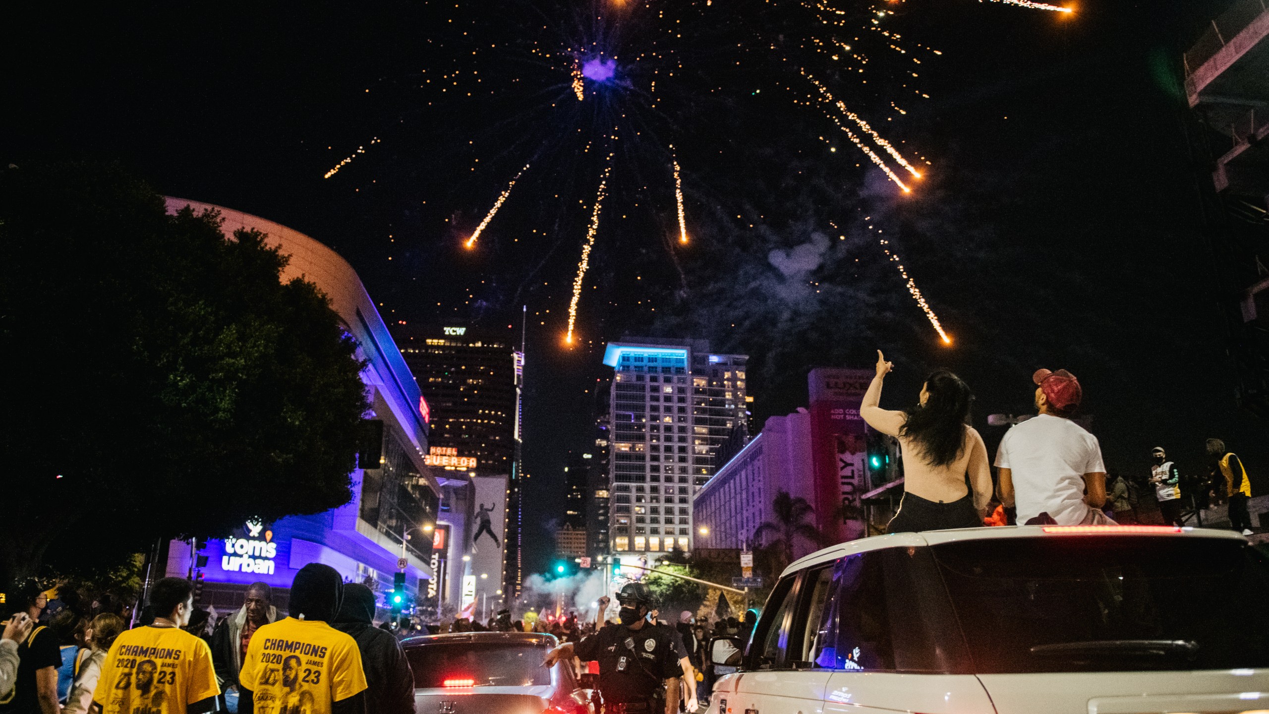 Lakers fans celebrate in front of the Staples Center on Oct. 11, 2020 in Los Angeles. (Brandon Bell/Getty Images)