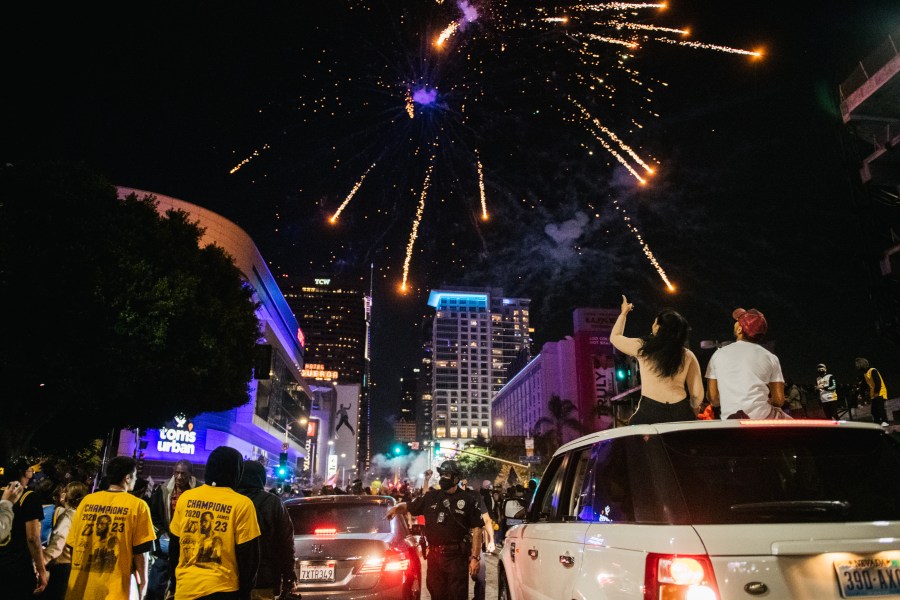 Lakers fans celebrate in front of the Staples Center on Oct. 11, 2020 in Los Angeles. (Brandon Bell/Getty Images)