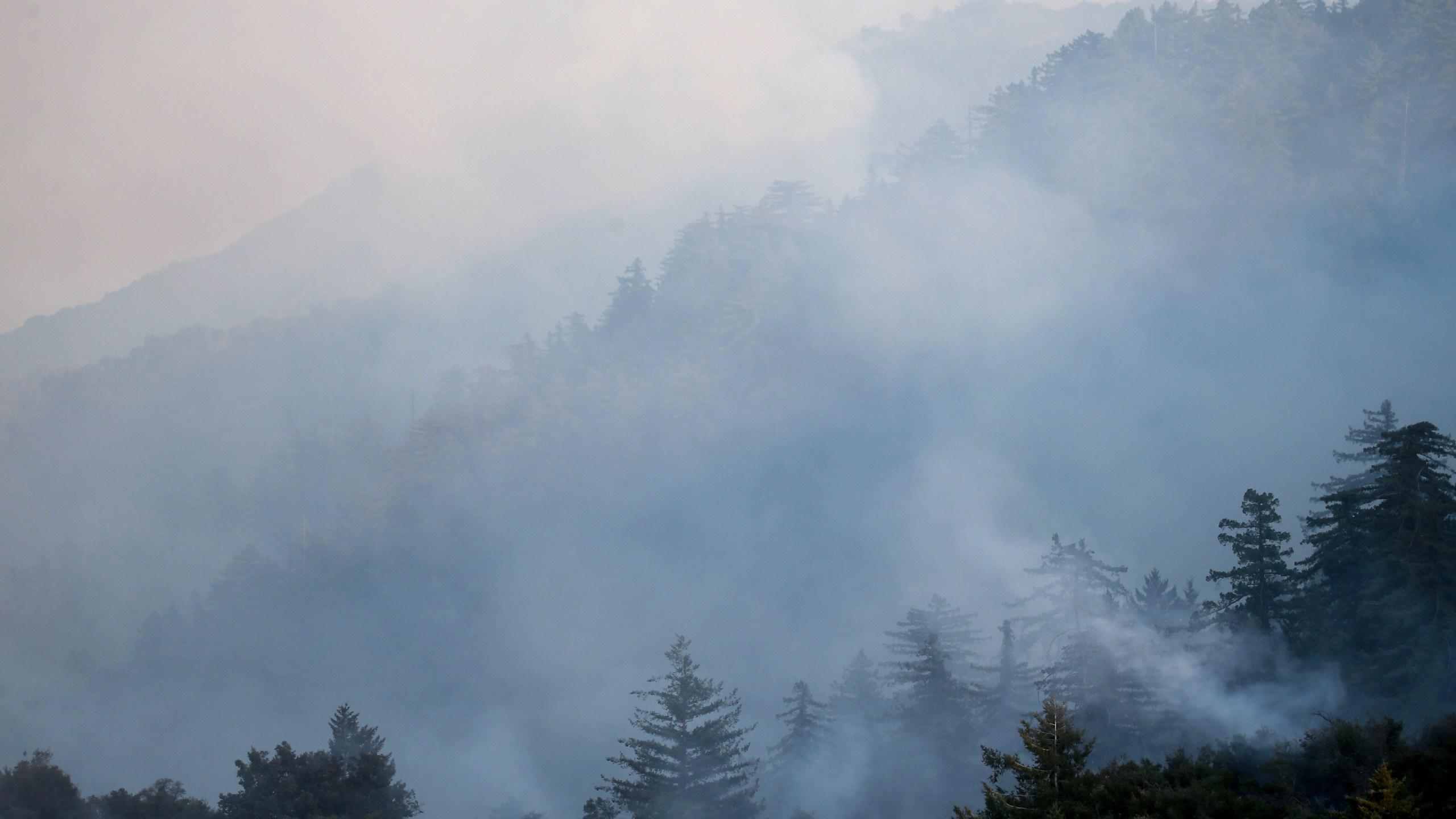 Smoke drifts over the Bobcat Fire in the Angeles National Forest on Sept. 23, 2020 near Pasadena. (Mario Tama/Getty Images)