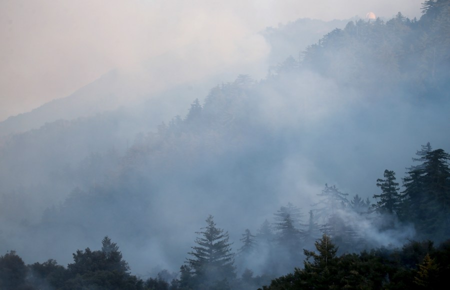 Smoke drifts over the Bobcat Fire in the Angeles National Forest on Sept. 23, 2020 near Pasadena. (Mario Tama/Getty Images)