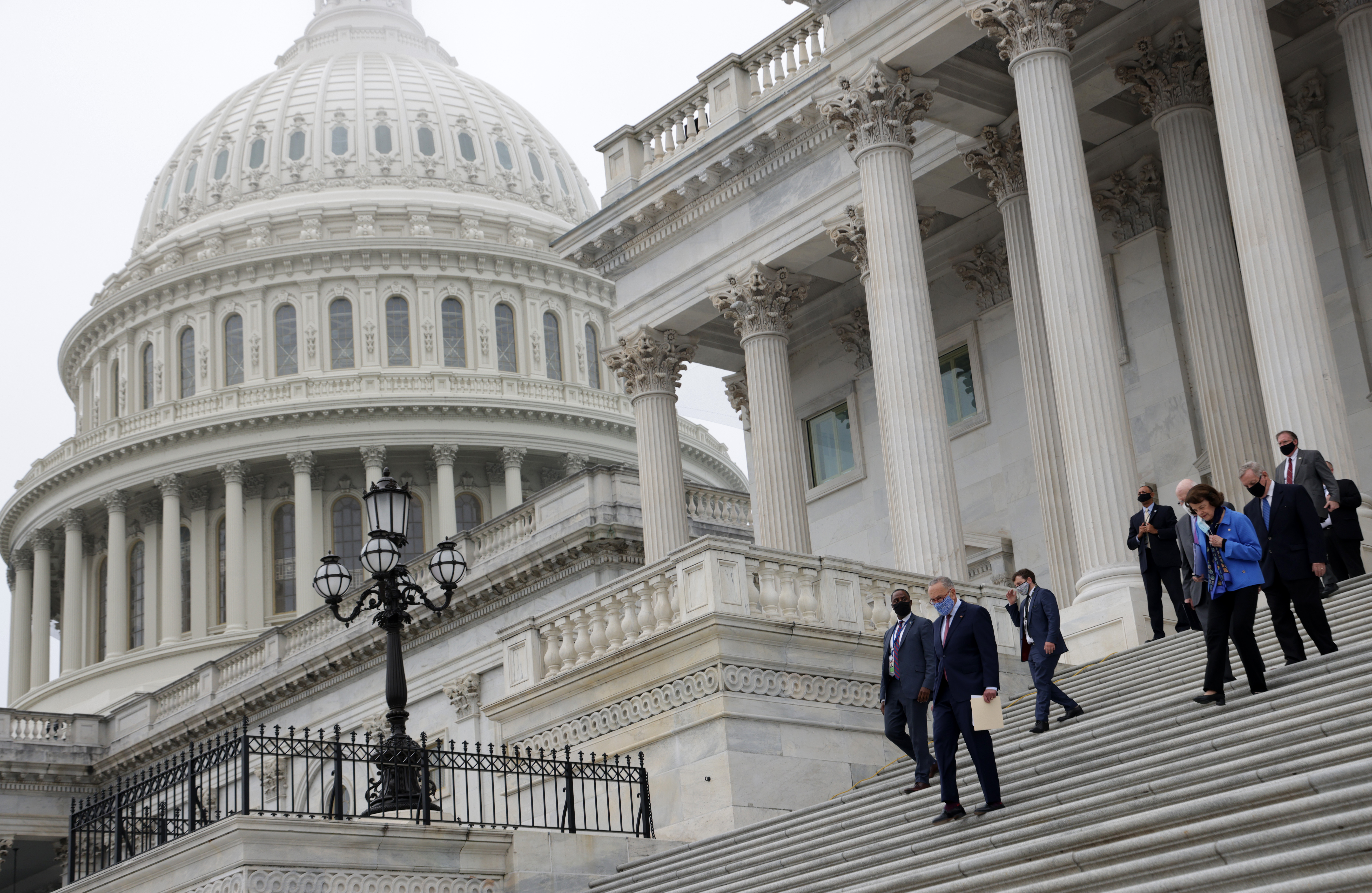 Democratic members of U.S. Senate Judiciary Committee walk down the east front steps of the U.S. Capitol for a news conference on Oct. 22, 2020 in Washington, DC. (Alex Wong/Getty Images)