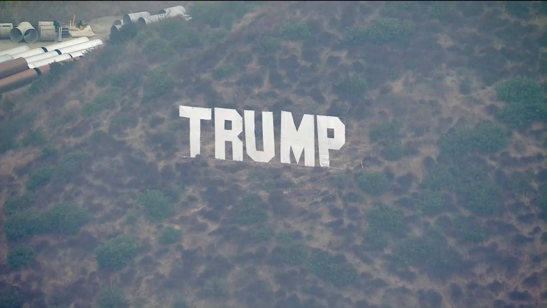 A Trump sign, comprised of Hollywood-sign style lettering, appeared on the 405 Freeway in the Sepulveda Pass on Oct. 6, 2020. (KTLA)