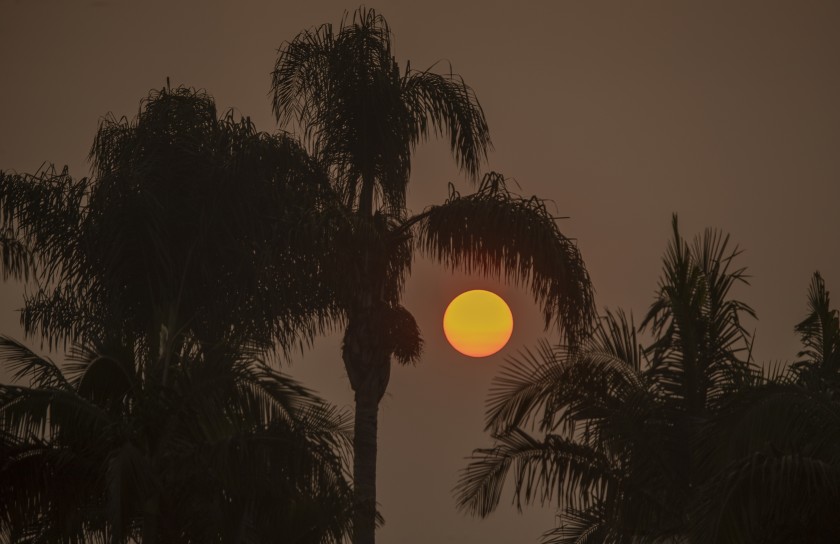 The sun is filtered through smoky air from California’s record wildfires.(Allen J. Schaben / Los Angeles Times)