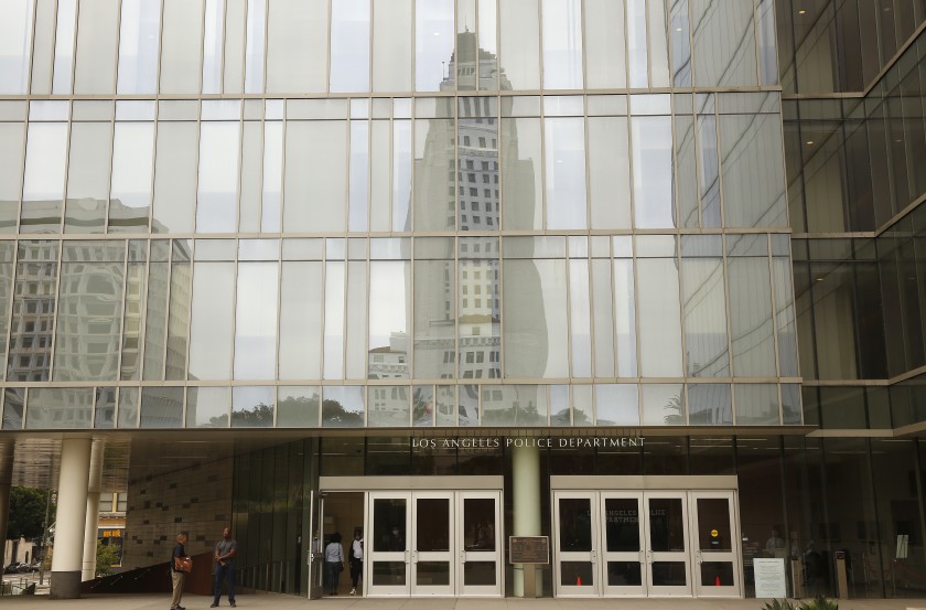 City Hall is reflected off LAPD headquarters in this undated file photo. (Al Seib / Los Angeles Times)