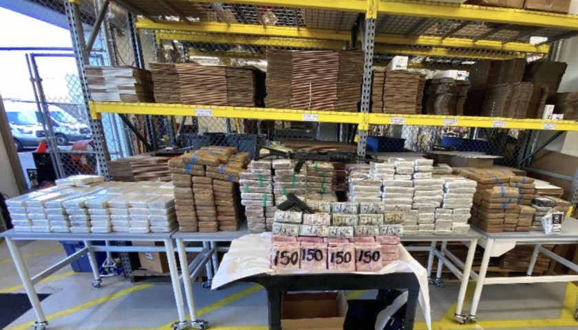 Federal agents seized $3.5 million in cash and massive quantities of cocaine, fentanyl and .50-caliber ammunition from an Otay Mesa truck yard. (Homeland Security Investigations)