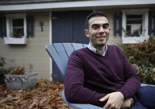 Joshua Pickar, of Lexington, Mass., sits for a photograph, Sunday, Nov. 20, 2016, in Lexington. The Rhodes Trust announced Sunday that Pickar is one of 32 Americans chosen as the 2017 Rhodes scholars. Pickar speaks several languages and plans a career in international law and policymaking. (AP Photo/Steven Senne)