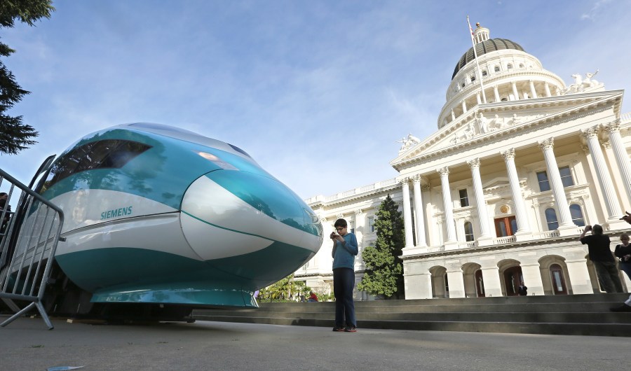 In this Feb. 26, 2015, file photo, a full-scale mock-up of a high-speed train is displayed at the Capitol in Sacramento. (AP Photo/Rich Pedroncelli, file)