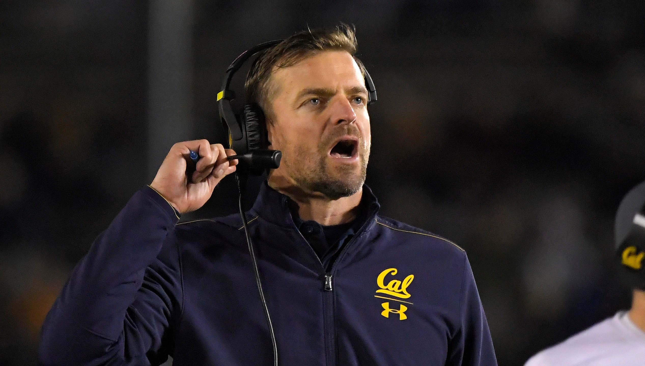 In this Nov. 30, 2019, file photo, California head coach Justin Wilcox reacts on the sideline during the second half of an NCAA college football game against UCLA in Pasadena, Calif. As Wilcox looks to navigate a season like none other, he can at least lean on a quarterback who has endured his share of trials winning the job. (AP Photo/Mark J. Terrill, File)