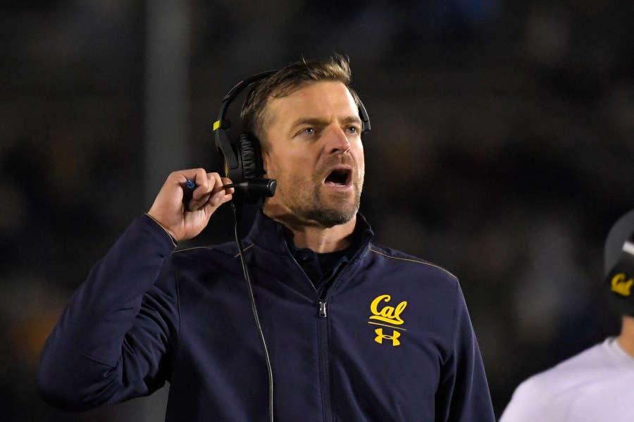 In this Nov. 30, 2019, file photo, California head coach Justin Wilcox reacts on the sideline during the second half of an NCAA college football game against UCLA in Pasadena, Calif. As Wilcox looks to navigate a season like none other, he can at least lean on a quarterback who has endured his share of trials winning the job. (AP Photo/Mark J. Terrill, File)