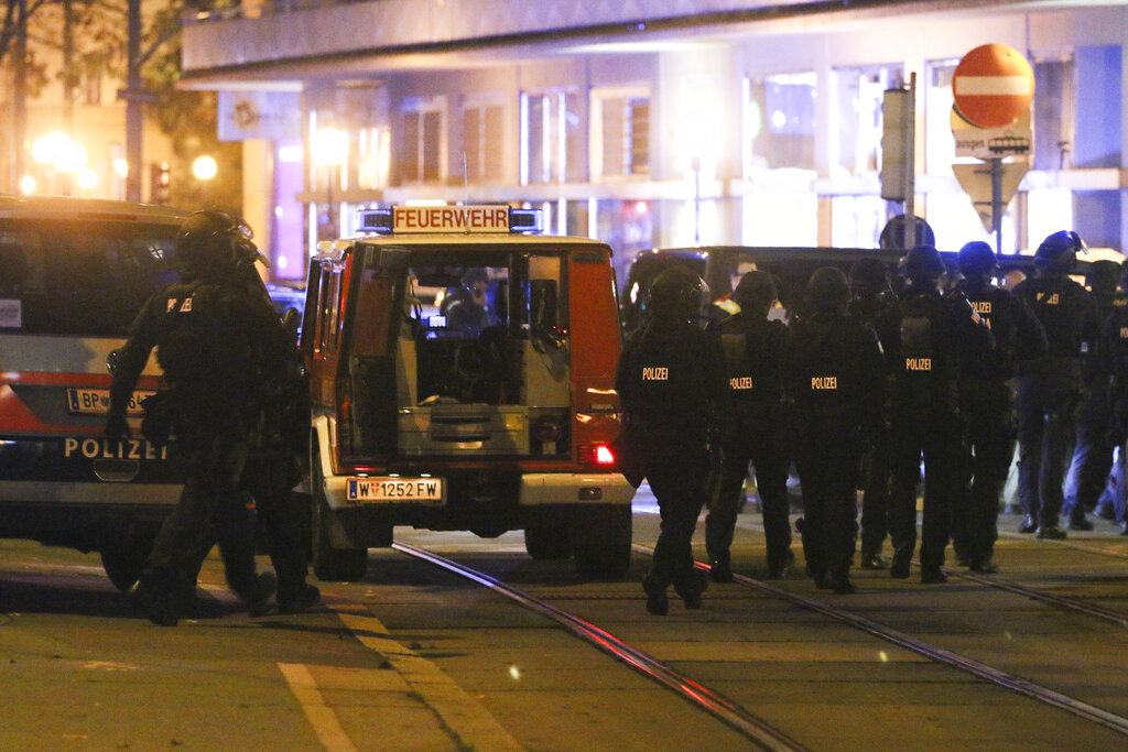 Police officers walk at the scene after gunshots were heard, in Vienna on Nov. 2, 2020. Austrian police say several people have been injured and officers are out in force following gunfire in the capital Vienna. Initial reports that a synagogue was the target of an attack couldn't immediately be confirmed. Austrian news agency APA quoted the country's Interior Ministry saying one attacker has been killed and another could be on the run.(Photo/Ronald Zak)