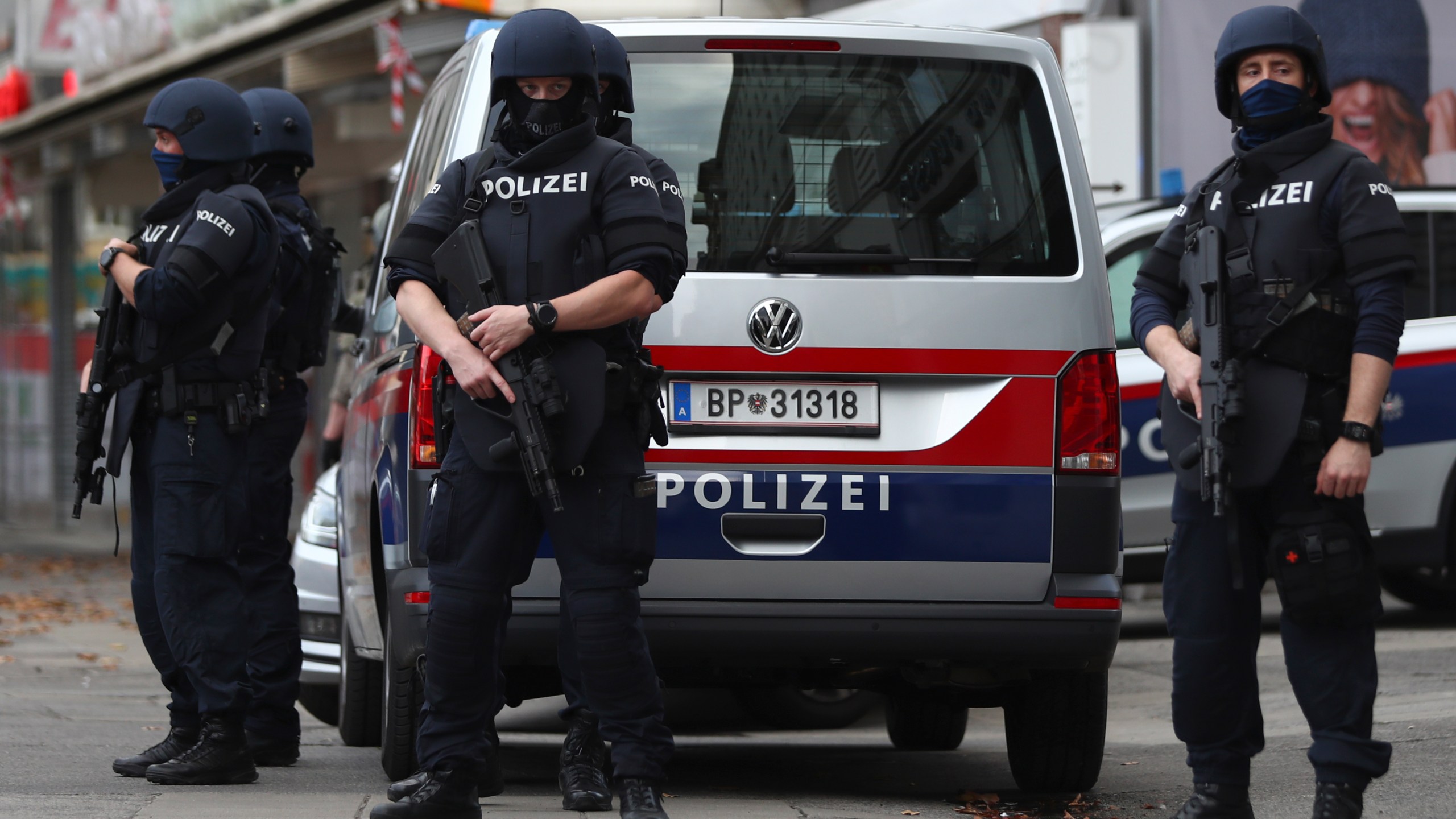 Police officers guard the scene in Vienna, Austria, Tuesday, Nov. 3, 2020. Police in the Austrian capital said several shots were fired shortly after 8 p.m. local time on Monday, Nov. 2, in a lively street in the city center of Vienna. (Matthias Schrader/AP Photo)