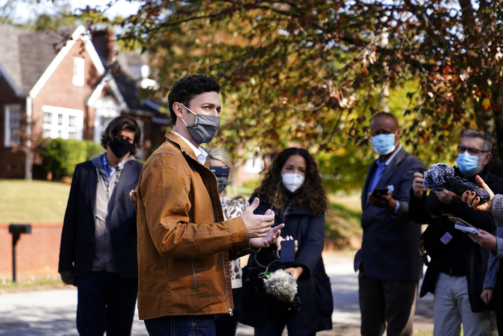 Democratic candidate for U.S. Senate Jon Ossoff speaks to the media on Election Day in Atlanta, Tuesday, Nov. 3, 2020. (AP Photo/Brynn Anderson)